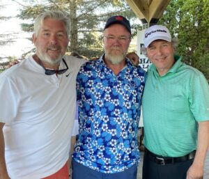 Doug Elliott PM Drive/PD 94.9 The Rock, hole-in-one winner Chuck Collie, and Craig Venn, morning host at 94.9 The Rock