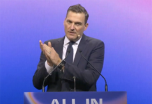 Evan Solomon, Canada's Minister of Artificial Intelligence and Digital Innovation, delivering opening remarks at ALL IN 2026.